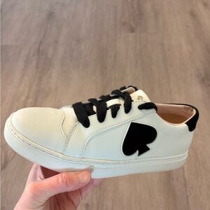 Kate Spade Women’s White and Black Lace-Up Sneaker with Heart Accent